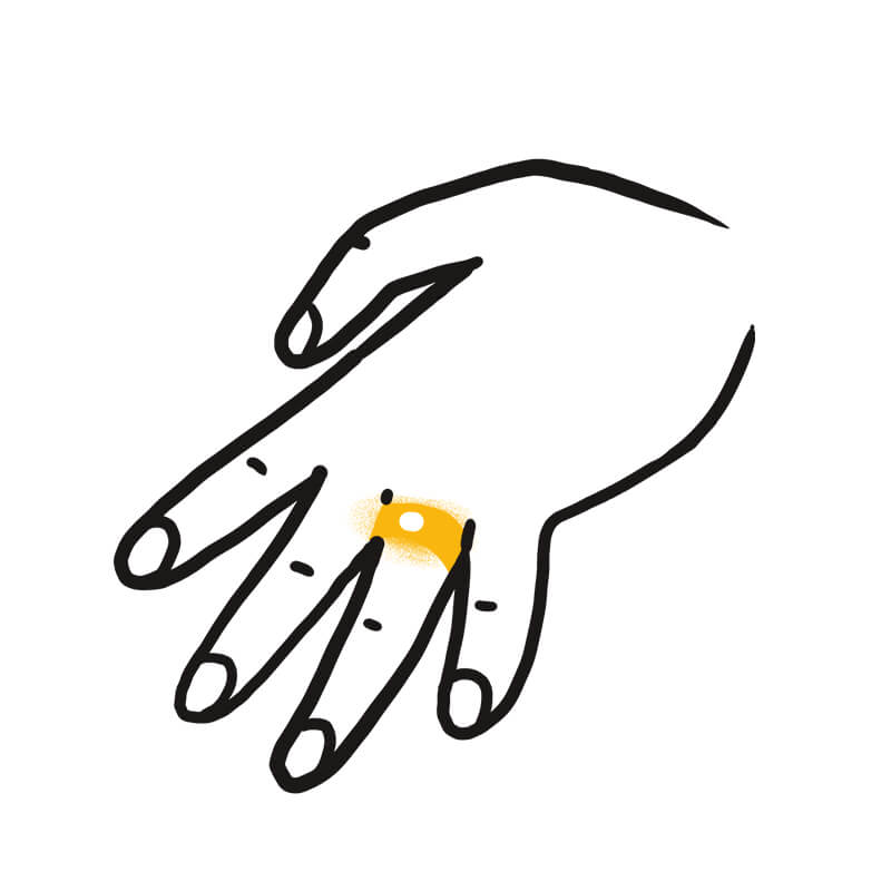 Eine einfache Strichzeichnung einer Hand mit einem kleinen gelben Kreis auf dem Ringfinger, der an die Symbolik der Traumdeutung Hund erinnert und einen bestimmten Punkt anzeigt.