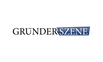 Das Logo zeigt das Wort GRÜNDER in schwarzer Schrift, gefolgt von SZENE in weißer Schrift auf blauem Hintergrund.