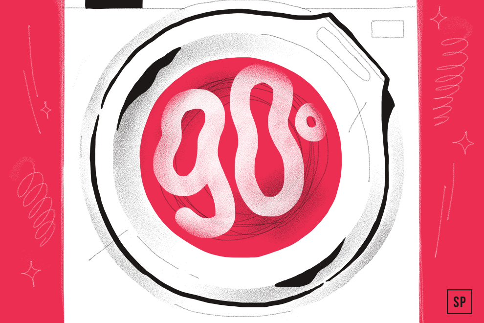 Illustration einer Waschmaschinentür mit 90° in fetter weißer Schrift auf rotem Hintergrund, die eine Hochtemperatur-90-Grad-Wäsche hervorhebt. Die Maschine ist schwarz umrandet und an den Seiten mit roten Paneelen versehen.