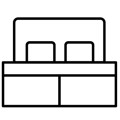 Eine einfache schwarz-weiße Strichzeichnung eines Bettes mit einem Kopfteil, zwei Kissen und einem rechteckigen Sockel.