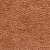 Nahaufnahme einer strukturierten braunen Oberfläche, die an Leder erinnert und ein Muster aus kleinen, unregelmäßigen, kieselsteinähnlichen Formen aufweist.