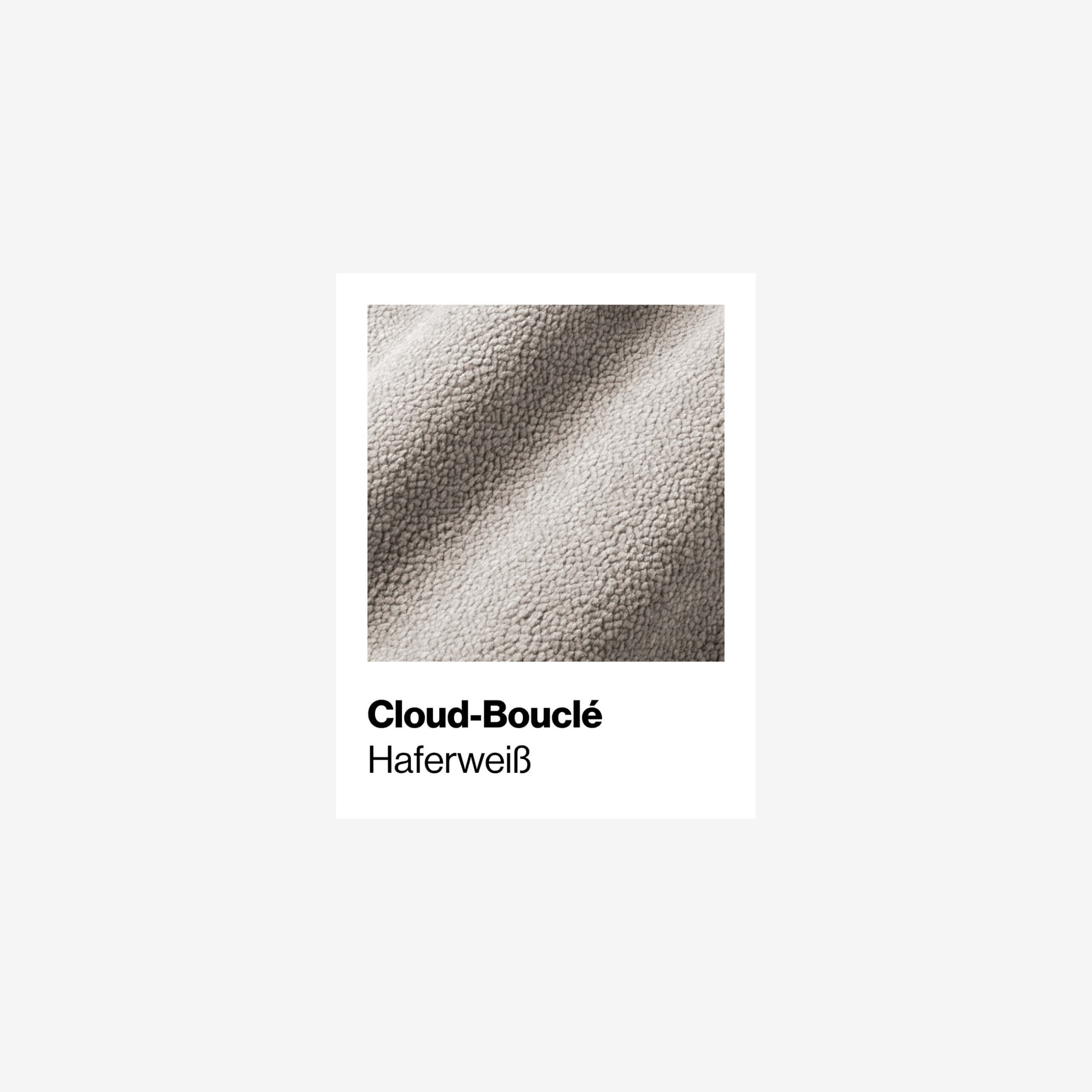 Eine Nahaufnahme des weichen, strukturierten Cloud-Bouclé-Stoffes in hellem Haferweiß, beschriftet mit Cloud-Bouclé Haferweiß auf einem sauberen weißen Hintergrund.