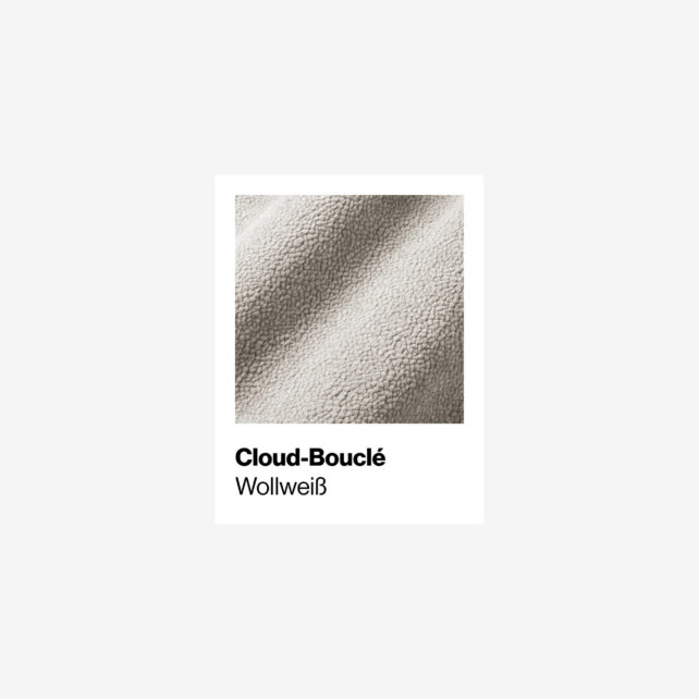 Eine Nahaufnahme eines hellbeigen, strukturierten Cloud-Bouclé-Stoffes mit der Aufschrift Wollweiß auf weißem Hintergrund. Der Text ist in fetter und regelmäßiger Schrift unterhalb des Stoffbildes angebracht.